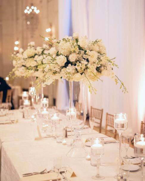 White Floral Filled Wedding Head Table Decor