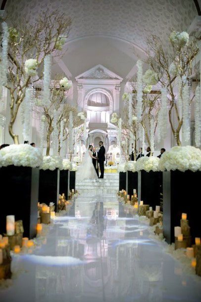 White Florals On Black Base Wedding Decor