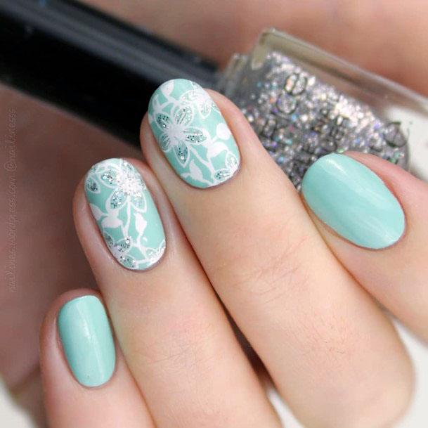 White Flower Art On Mint Toned Nails Women