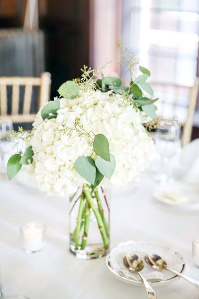 White Hydrangea Wedding Flowers On Dining Table