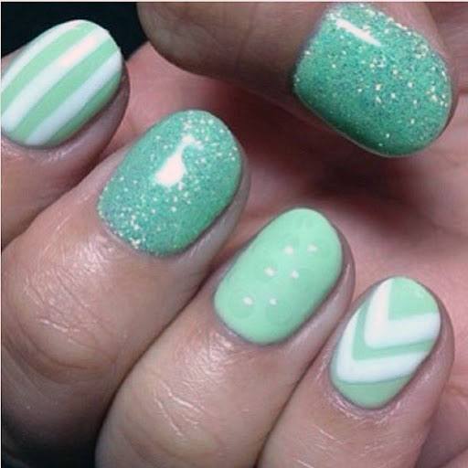 White Lines And Chevron Design On Mint Nails Women