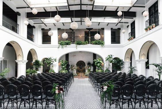 White Palace And Black Chairs Wedding Decor