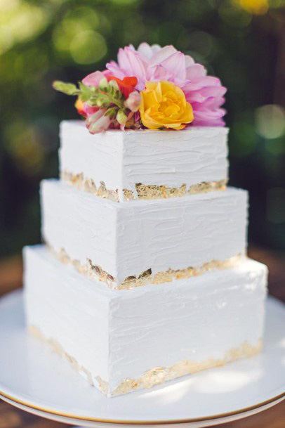 White Square Wedding Cake With Colored Flowers