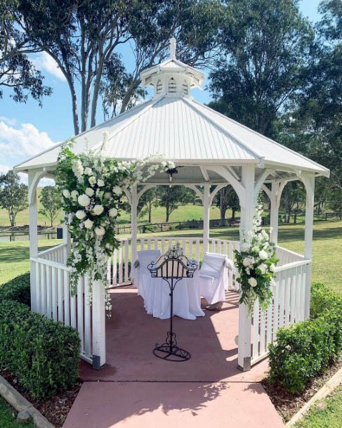 White Tent And Flowers Wedding