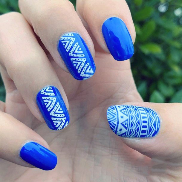 White Tribal Art On Cobalt Blue Nails For Women