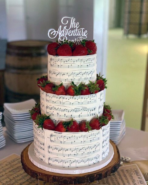 White Unique Wedding Cake With Strawberries