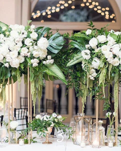 White Wedding Flowers In Glass Vase