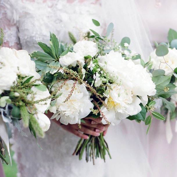 White Wedding Flowers With Green Leaves