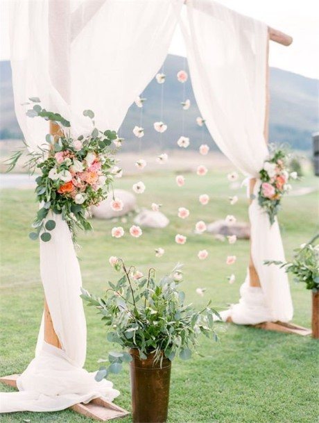 White With Flowers Wedding Arch Ideas