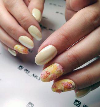 Whitish Pale Yellow Nails With Floral Designs For Women