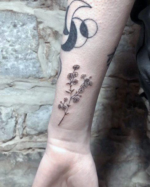 Woman With Babys Breath Tattoo