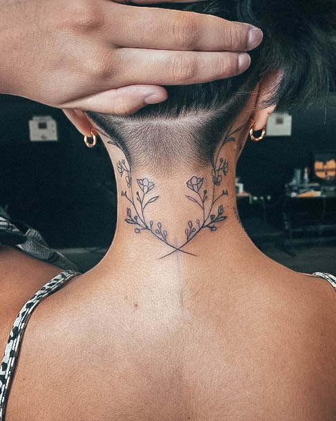 Woman With Back Of Neck Tattoo