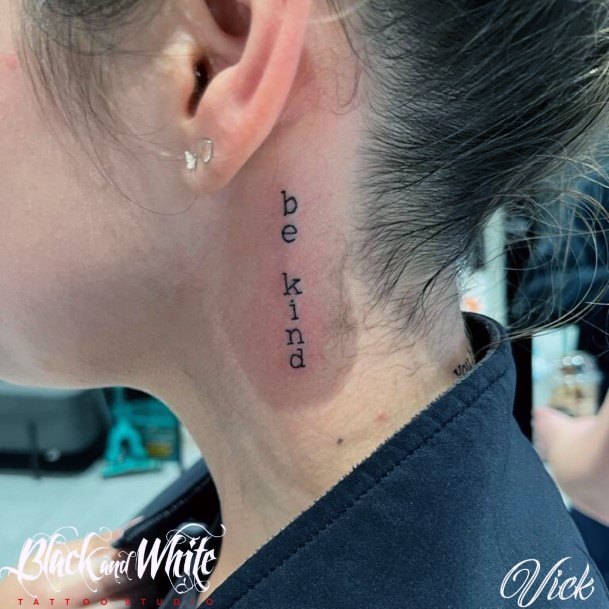 Woman With Be Kind Tattoo