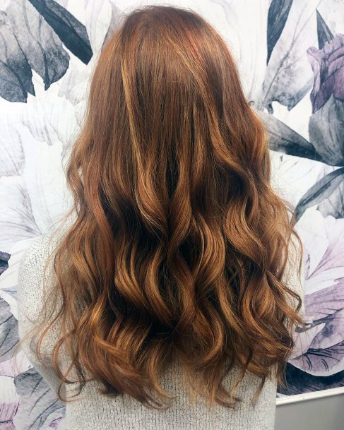 Woman With Beautiful Auburn Coloring And Slight Curls