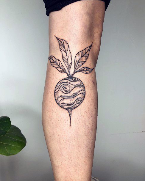 Woman With Beet Tattoo