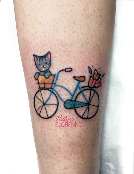 Woman With Bicycle Tattoo