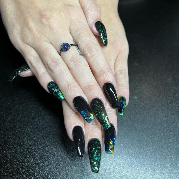 Woman With Black And Green Nail