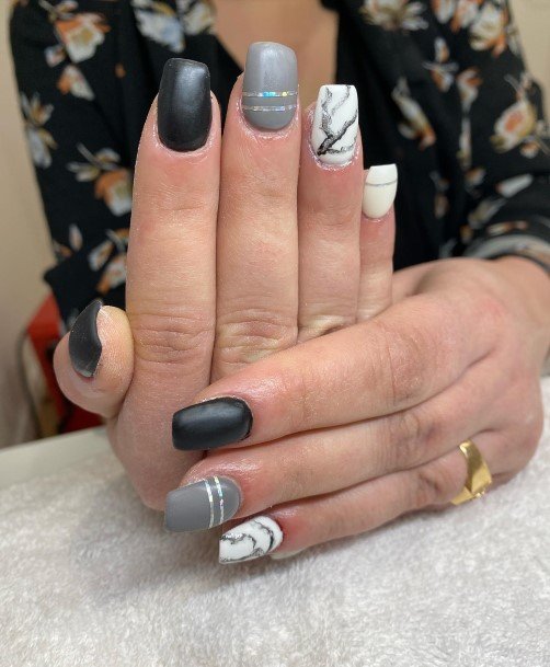 Woman With Black And Grey Nail