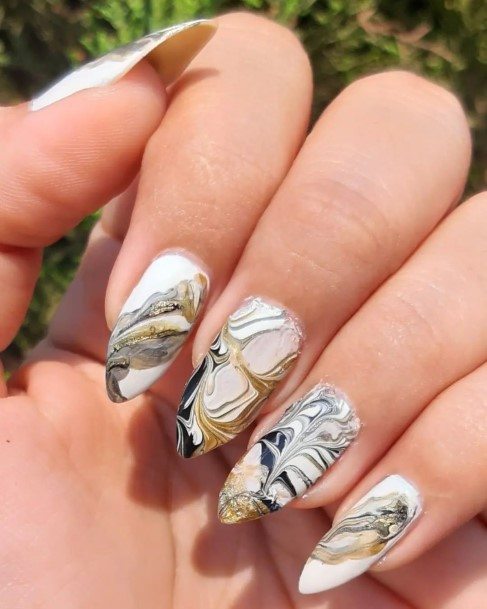 Woman With Black And White Marble Nail