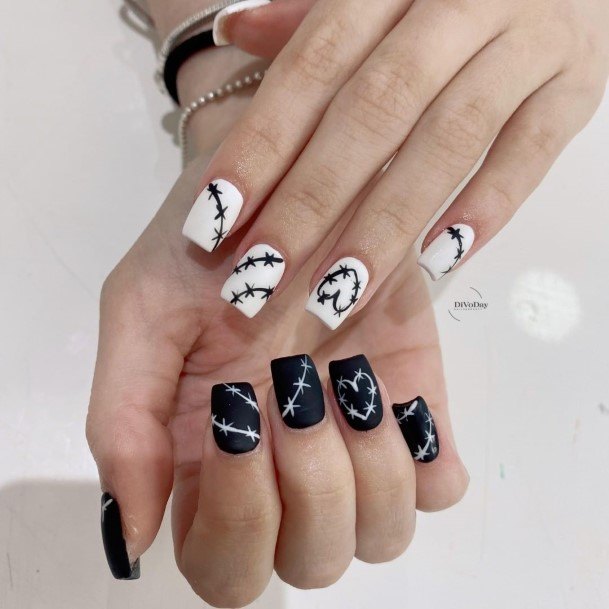 Woman With Black And White Nail