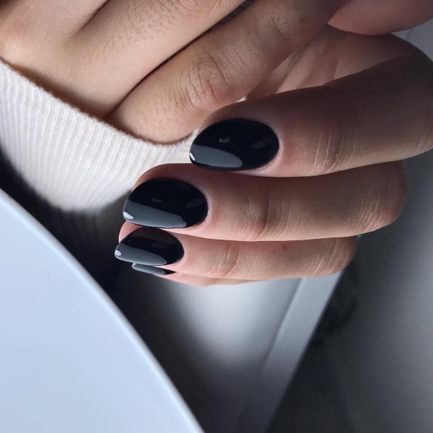 Woman With Black Oval Nail