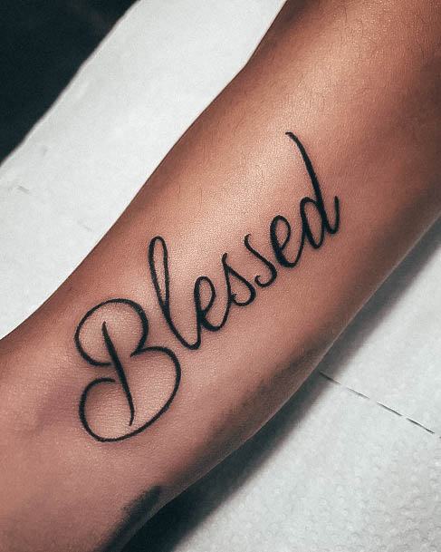 Woman With Blessed Tattoo