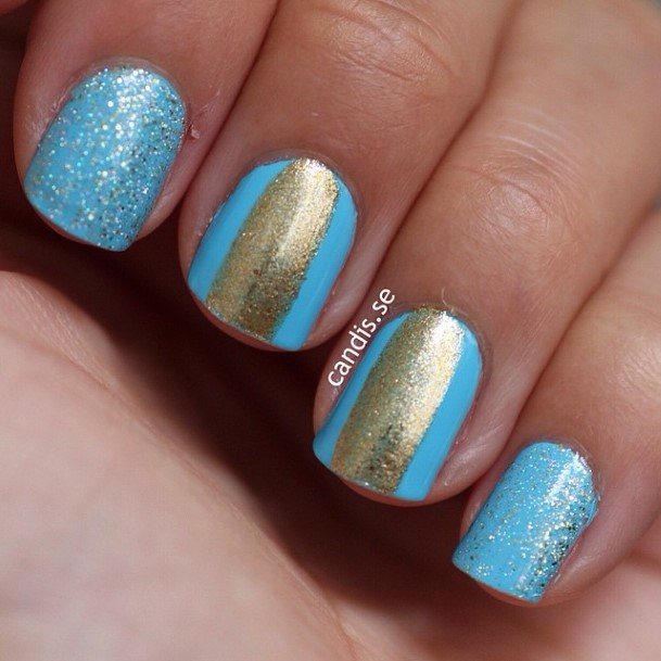 Woman With Blue And Gold Nail