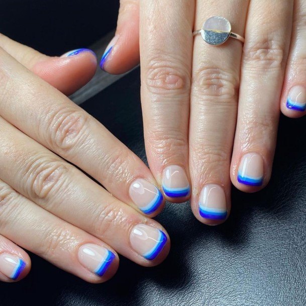 Woman With Blue French Tip Nail