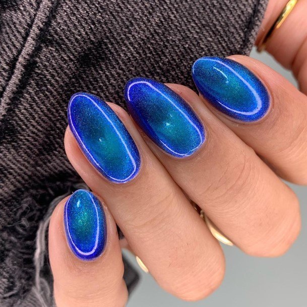 Woman With Blue Glitter Nail