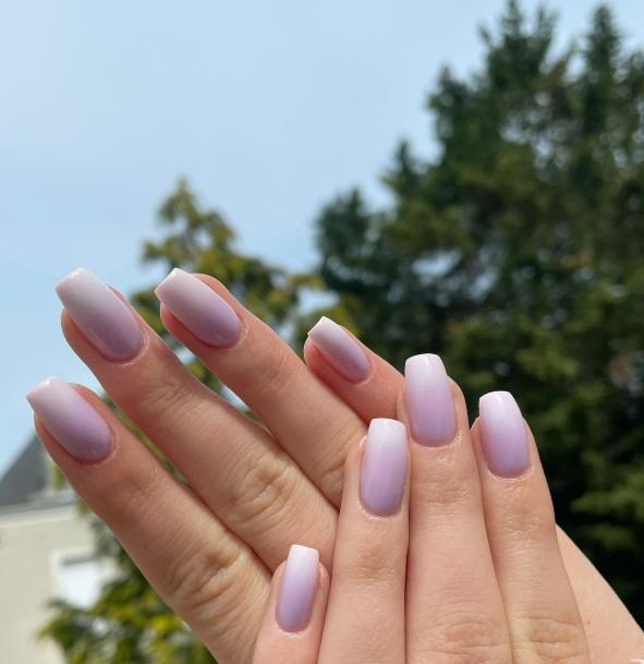 Woman With Bright Purple Nail