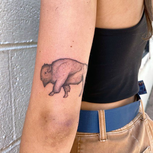 Woman With Buffalo Tattoo