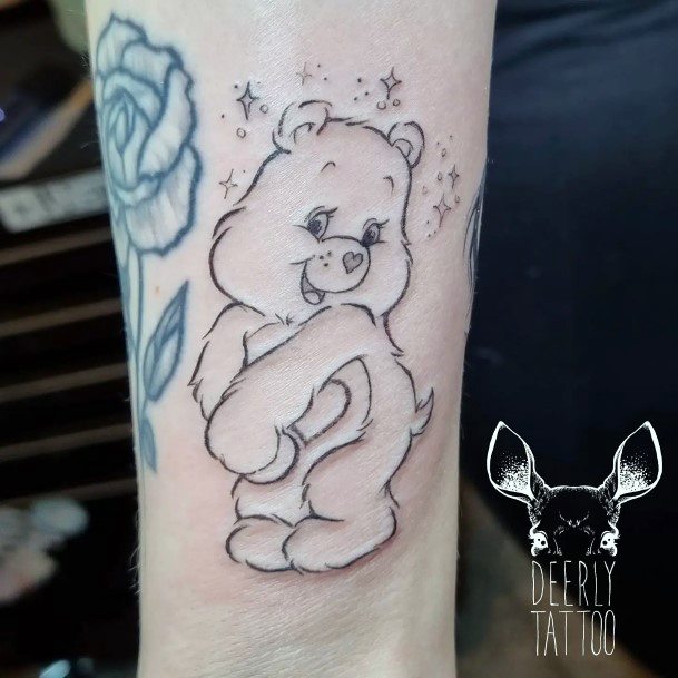 Woman With Carebears Tattoo