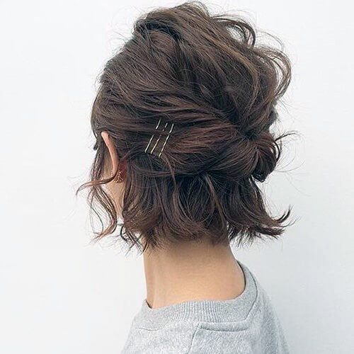 Woman With Chin Length Hair And Easy Pull Back With Hair Pins