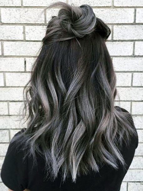 Woman With Criss Cross Action Hair Grey Highlighted Fun Hairstyle