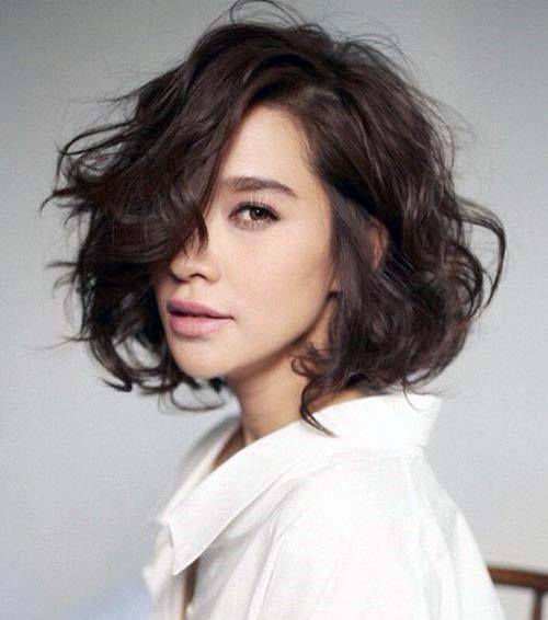 Woman With Cute Textured Brunette Bob Hairstyle Hassle Free Natural