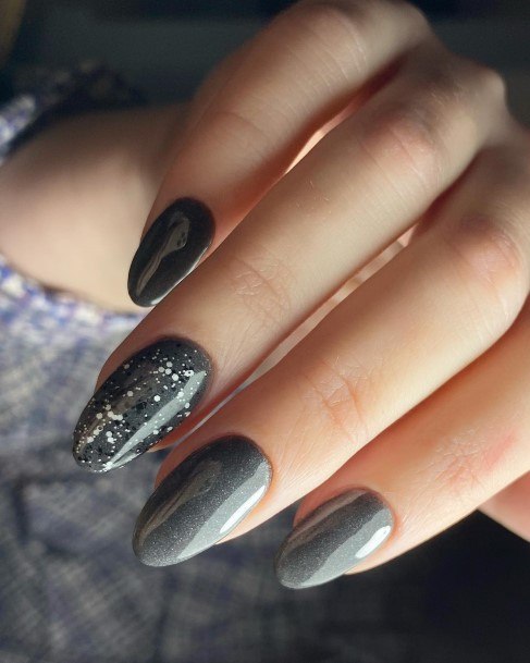 Woman With Dark Grey Nail