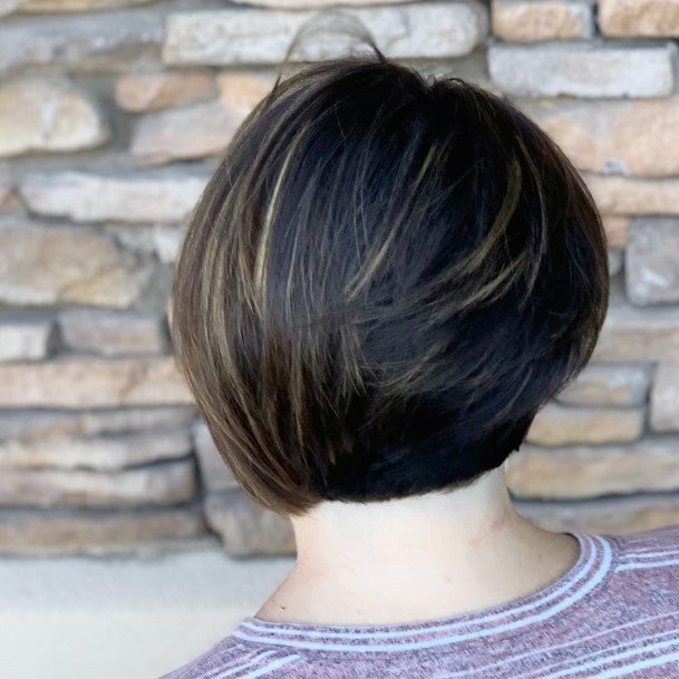 Woman With Dark Hair And Streaks Of Golden Brown Thick Hair