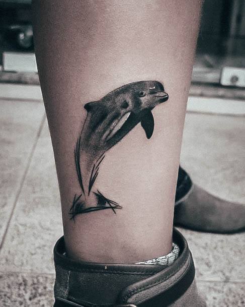 Woman With Dolphin Tattoo