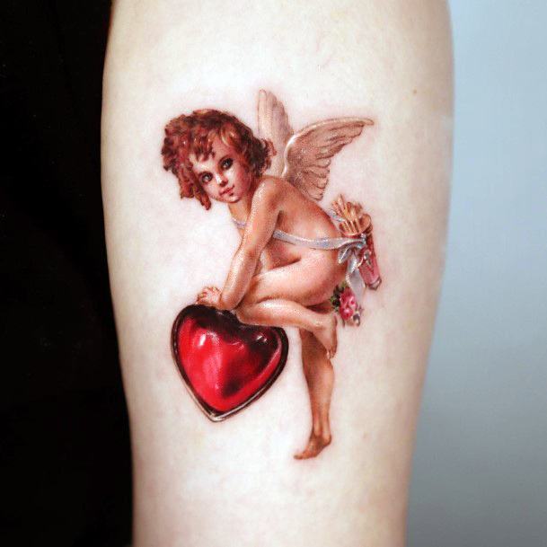 Woman With Fabulous Baby Angel Tattoo Design