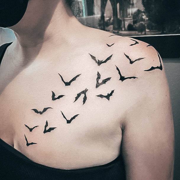 Woman With Fabulous Bat Tattoo Design