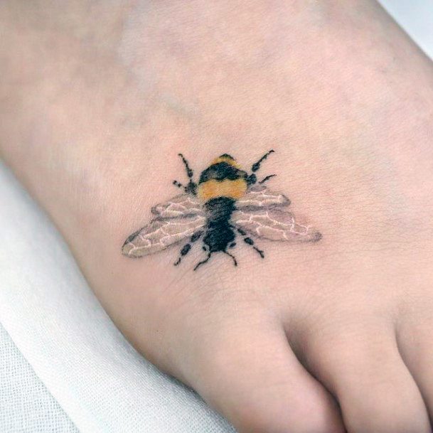 Woman With Fabulous Bee Tattoo Design