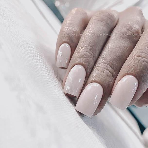 Woman With Fabulous Beige Nail Design