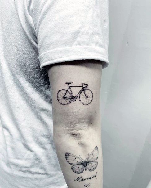 Woman With Fabulous Bicycle Tattoo Design