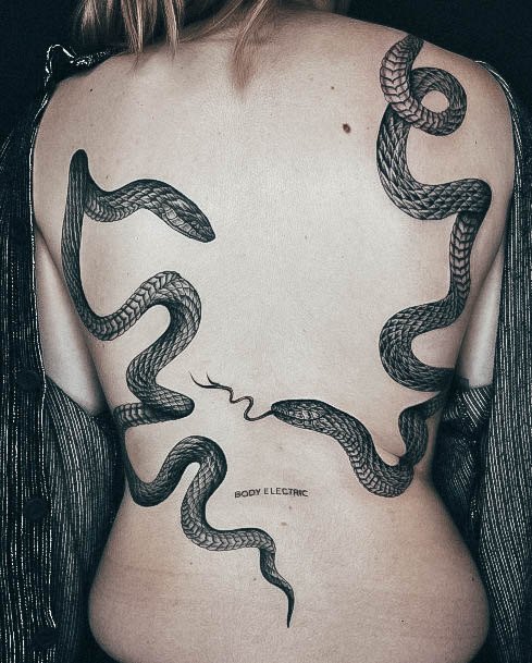 Woman With Fabulous Black And White Tattoo Design