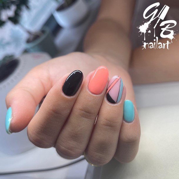 Woman With Fabulous Black Oval Nail Design