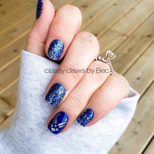 Woman With Fabulous Blue And Silver Nail Design