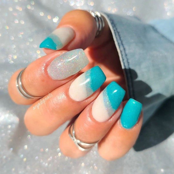 Woman With Fabulous Blue Short Nail Design