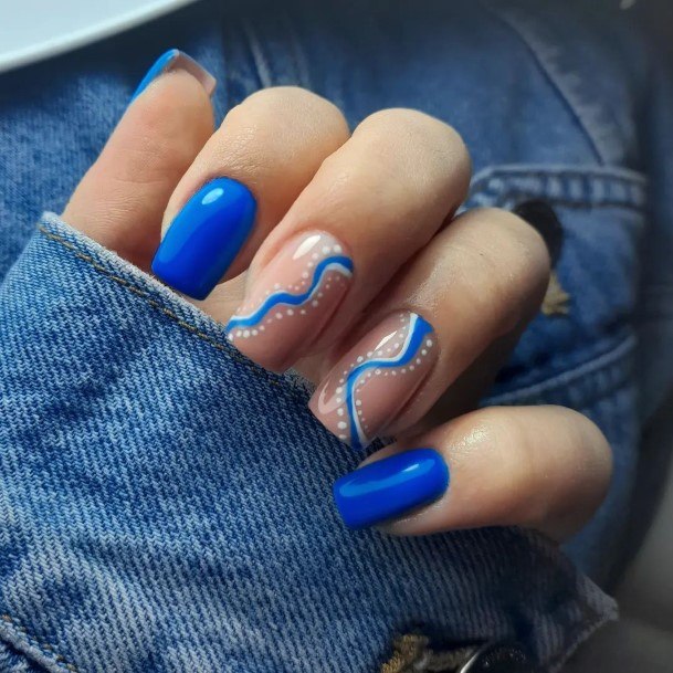 Woman With Fabulous Blue Summer Nail Design