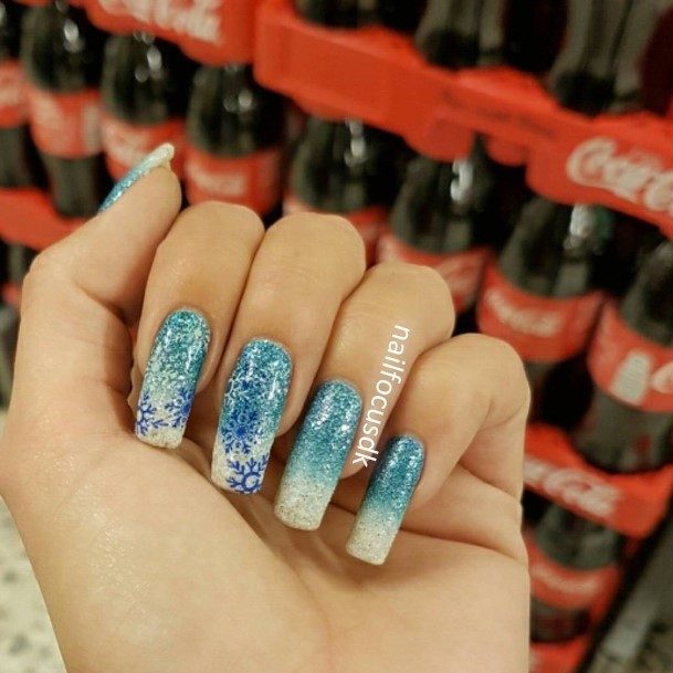 Woman With Fabulous Blue Winter Nail Design