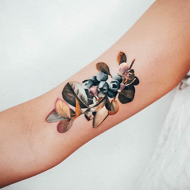 Woman With Fabulous Blueberry Tattoo Design